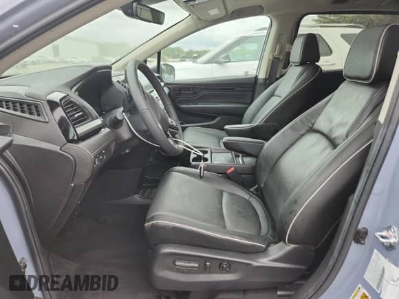 2025 Honda Odyssey Touring с VIN 5FNRL6H87SB074287, выставлен на аукционе Copart как лот 65152345 с пробегом Не указан миль и Списание • Salvage title. История ставок и продаж доступна на DreamBid. Изображение 7.