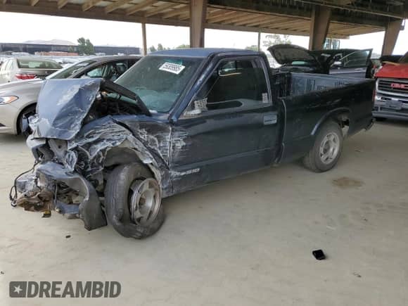 1998 Chevrolet S-10 LS with VIN 1GCCS1443WK268788, listed as a Copart auction lot 59309985 with 234,976 mi miles and Salvage title. Bid and sale history available at DreamBid. Image 1.