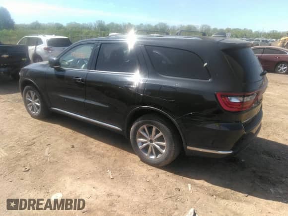 2014 Dodge Durango Limited with VIN 1C4RDHDG2EC402609, listed as a IAAI auction lot 33031286 with 73,700 mi miles and . Bid and sale history available at DreamBid. Image 3.