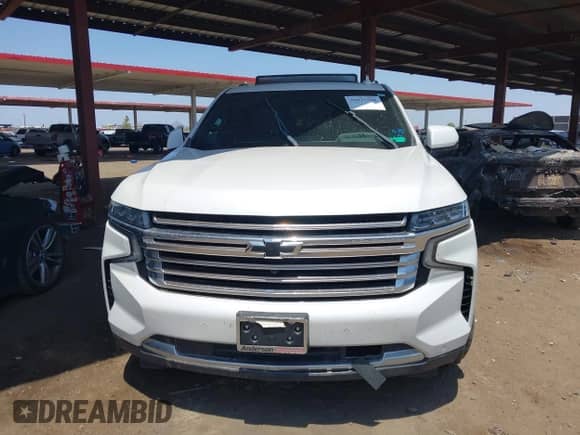 2021 Chevrolet Suburban High Country z VIN 1GNSCGKL3MR190496, wystawiony jako IAAI lot #39935508 z przebiegiem Nie podano mil oraz . Historia ofert i sprzedaży dostępna na DreamBid. Obrazek 11.