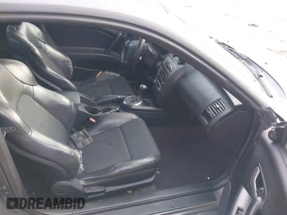 2007 Hyundai Tiburon GT with VIN KMHHN66F47U238578, listed as a IAAI auction lot 41577890 with 182,186 mi miles and . Bid and sale history available at DreamBid. Image 5.