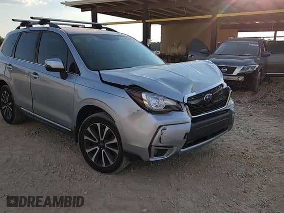 2017 Subaru Forester Touring z VIN JF2SJGWC2HH447041, wystawiony jako Copart lot #81063375 z przebiegiem 158 510 mil mil oraz Szkoda całkowita • Salvage title. Historia ofert i sprzedaży dostępna na DreamBid. Obrazek 14.