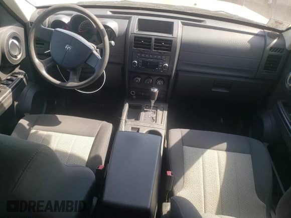 2010 Dodge Nitro SE with VIN 1D4PT2GK8AW124799, listed as a Copart auction lot 71811164 with 108,013 mi miles and Salvage title. Bid and sale history available at DreamBid. Image 8.