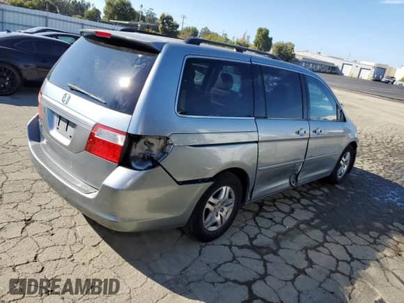 2007 Honda Odyssey EX-L с VIN 5FNRL38767B121645, выставлен на аукционе Copart как лот 87224365 с пробегом 167 747 миль миль и Списание • Salvage title. История ставок и продаж доступна на DreamBid. Изображение 3.