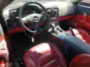 2010 Chevrolet Corvette 2LT с VIN 1G1YF2DW1A5101458, выставлен на аукционе Copart как лот 53682255 с пробегом 77 023 миль миль и Списание • Salvage title. История ставок и продаж доступна на DreamBid. Изображение 8.