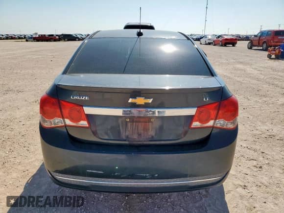 2016 Chevrolet Cruze LT with VIN 1G1PE5SB4G7156404, listed as a Copart auction lot 65066555 with 129,586 mi miles and Salvage title. Bid and sale history available at DreamBid. Image 6.