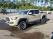 2018 Toyota Tacoma SR with VIN 3TMCZ5AN3JM150306, listed as a Copart auction lot 83791375 with 121,988 mi miles and Salvage title. Bid and sale history available at DreamBid. Image 1.