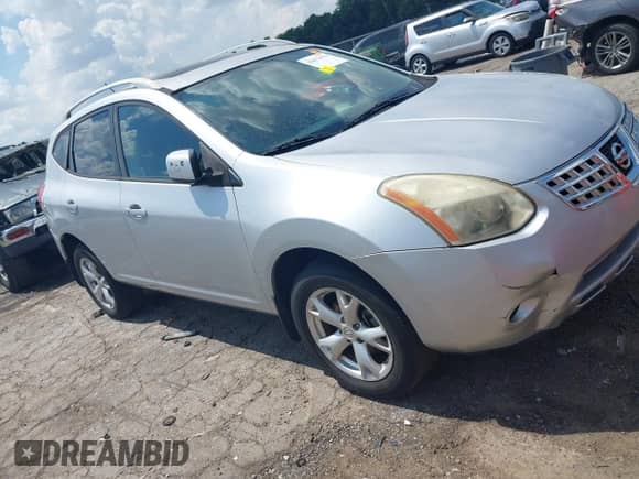 2009 Nissan Rogue SL z VIN JN8AS58T29W054604, wystawiony jako IAAI lot #42671076 z przebiegiem 208 276 mil mil oraz . Historia ofert i sprzedaży dostępna na DreamBid. Obrazek 1.