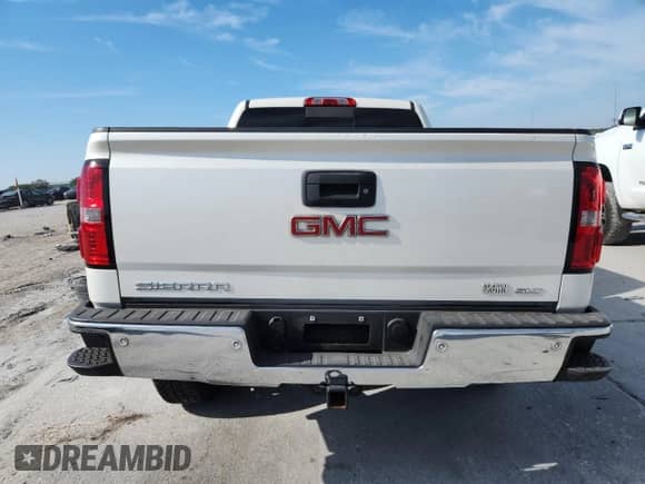 2015 GMC Sierra 1500 SLT с VIN 3GTP1VEC6FG441535, выставлен на аукционе Copart как лот 81730545 с пробегом 112 897 миль миль и Списание • Salvage title. История ставок и продаж доступна на DreamBid. Изображение 6.