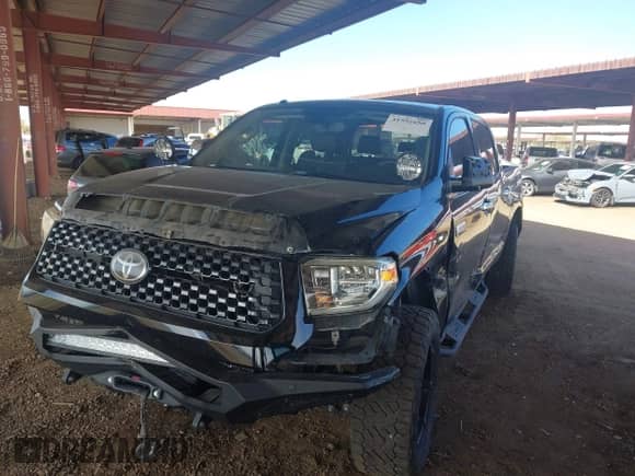 2019 Toyota Tundra SR5 with VIN 5TFAY5F19KX791004, listed as a IAAI auction lot 41592650 with 77,645 mi miles and . Bid and sale history available at DreamBid. Image 2.