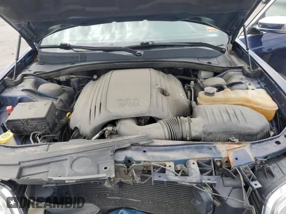 2014 Chrysler 300 C z VIN 2C3CCAKT2EH327976, wystawiony jako Copart lot #65556365 z przebiegiem 112 086 mil mil oraz Szkoda całkowita • Salvage title. Historia ofert i sprzedaży dostępna na DreamBid. Obrazek 11.