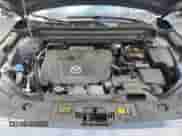 2024 Mazda CX-5 S Carbon Edition z VIN JM3KFBCL7R0523562, wystawiony jako Copart lot #84481885 z przebiegiem 30 371 mil mil oraz Czysty tytuł • Clean title. Historia ofert i sprzedaży dostępna na DreamBid. Obrazek 12.