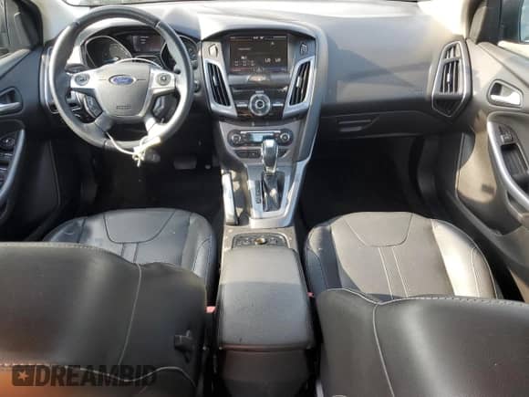 2013 Ford Focus Titanium with VIN 1FADP3J29DL129007, listed as a Copart auction lot 66289165 with 72,489 mi miles and Salvage title. Bid and sale history available at DreamBid. Image 8.