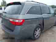 2012 Honda Odyssey EX z VIN 5FNRL5H40CB083650, wystawiony jako IAAI lot #43283741 z przebiegiem 164 693 mil mil oraz . Historia ofert i sprzedaży dostępna na DreamBid. Obrazek 17.