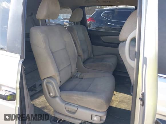 2012 Honda Odyssey LX with VIN 5FNRL5H29CB054971, listed as a IAAI auction lot 41582882 with 261,874 mi miles and . Bid and sale history available at DreamBid. Image 8.