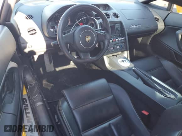 2014 Lamborghini Gallardo с VIN ZHWGU5BZ7ELA13923, выставлен на аукционе Copart как лот 82374714 с пробегом 33 260 миль миль и Списание • Salvage title. История ставок и продаж доступна на DreamBid. Изображение 8.