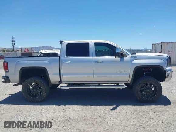 2017 GMC Sierra 1500 SLT z VIN 3GTU1NER3HG498785, wystawiony jako IAAI lot #42629458 z przebiegiem 41 962 mil mil oraz . Historia ofert i sprzedaży dostępna na DreamBid. Obrazek 13.