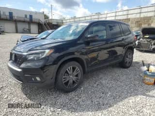 2021 Honda Passport EX-L with VIN 5FNYF8H55MB017318, listed as a Copart auction lot 84193975 with 66,214 mi miles and Salvage title. Bid and sale history available at DreamBid. Image 1.