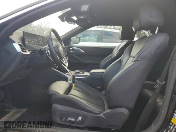 2024 BMW 4 Series 430i xDrive with VIN WBA43AT02RCN28707, listed as a Copart auction lot 84617304 with Not provided miles and Salvage title. Bid and sale history available at DreamBid. Image 7.