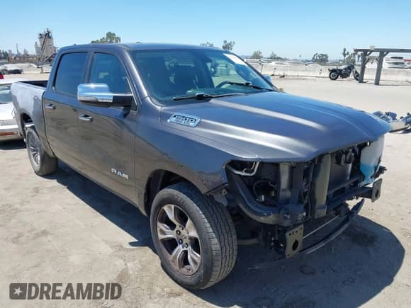 2019 Ram 1500 Laramie with VIN 1C6RREJT3KN894303, listed as a IAAI auction lot 42642439 with 84,379 mi miles and . Bid and sale history available at DreamBid. Image 1.