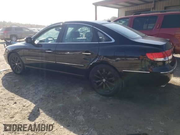 2010 Hyundai Azera Limited z VIN KMHFC4DF7AA450601, wystawiony jako Copart lot #77440654 z przebiegiem 208 867 mil mil oraz Szkoda całkowita • Salvage title. Historia ofert i sprzedaży dostępna na DreamBid. Obrazek 2.