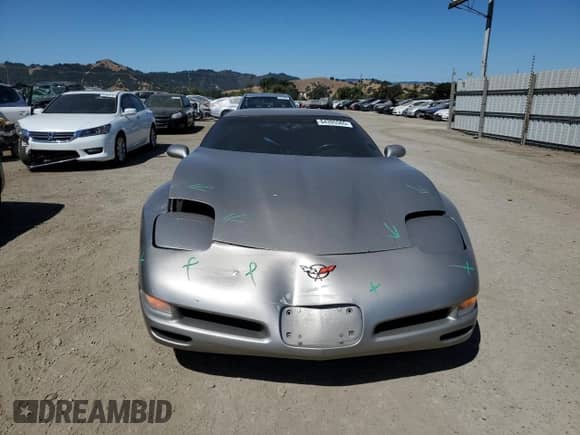 2002 Chevrolet Corvette с VIN 1G1YY22G425122733, выставлен на аукционе Copart как лот 64395565 с пробегом 107 474 миль миль и Списание • Salvage title. История ставок и продаж доступна на DreamBid. Изображение 5.