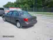 2001 Saturn SL with VIN 1G8ZF52851Z238231, listed as a IAAI auction lot 42454503 with 144,748 mi miles and . Bid and sale history available at DreamBid. Image 3.