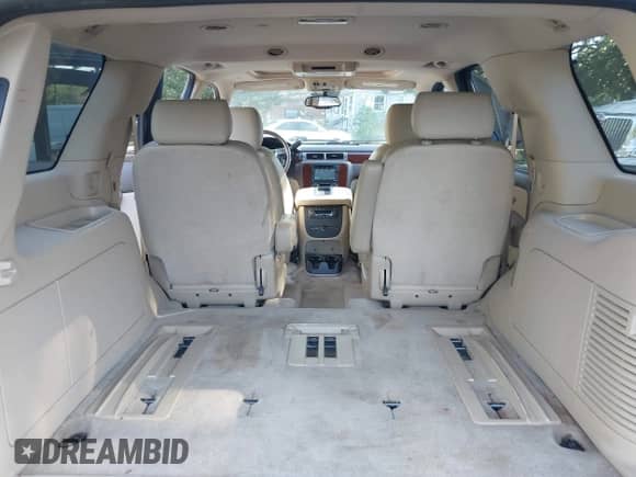 2010 Chevrolet Tahoe LTZ with VIN 1GNUKCE0XAR174233, listed as a IAAI auction lot 43380569 with 149,369 mi miles and . Bid and sale history available at DreamBid. Image 20.