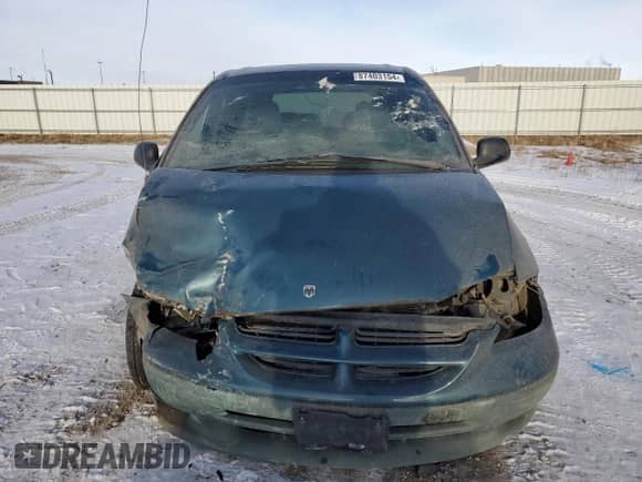 2000 Dodge Caravan SE z VIN 2B4GP45G2YR702617, wystawiony jako Copart lot #87403154 z przebiegiem Nie podano mil oraz Szkoda całkowita • Salvage title. Historia ofert i sprzedaży dostępna na DreamBid. Obrazek 5.