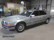 1997 BMW 7 Series 740iL with VIN WBAGJ8321VDM03554, listed as a Copart auction lot 71351095 with 143,449 mi miles and Salvage title. Bid and sale history available at DreamBid. Image 1.