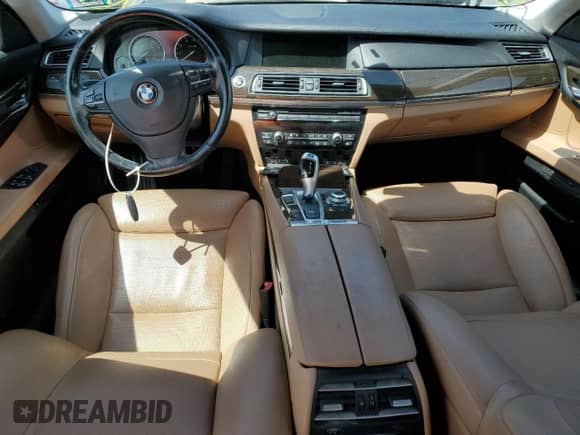 2011 BMW 7 Series 740i с VIN WBAKA4C55BC612973, выставлен на аукционе Copart как лот 66282185 с пробегом 106 117 миль миль и Списание • Salvage title. История ставок и продаж доступна на DreamBid. Изображение 8.