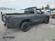 2003 Dodge Dakota с VIN 1D7FL36X03S159557, выставлен на аукционе Copart как лот 85516535 с пробегом 209 972 миль миль и Списание • Salvage title. История ставок и продаж доступна на DreamBid. Изображение 3.