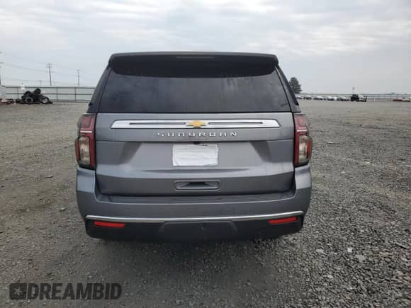 2021 Chevrolet Suburban LS z VIN 1GNSKBEDXMR171549, wystawiony jako Copart lot #70555665 z przebiegiem Nie podano mil oraz Szkoda całkowita • Salvage title. Historia ofert i sprzedaży dostępna na DreamBid. Obrazek 6.