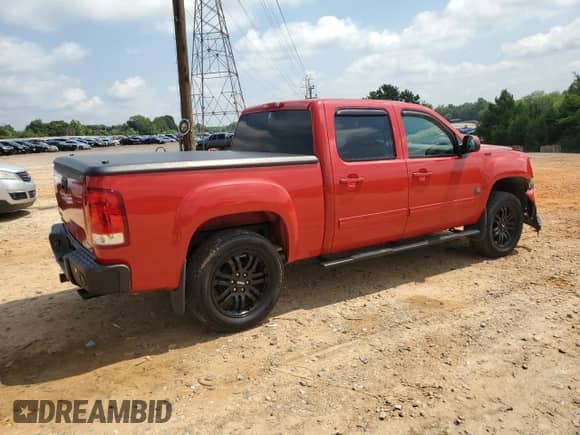 2009 GMC Sierra 1500 SLT with VIN 3GTEK33309G248250, listed as a Copart auction lot 62177265 with 207,384 mi miles and Salvage title. Bid and sale history available at DreamBid. Image 3.