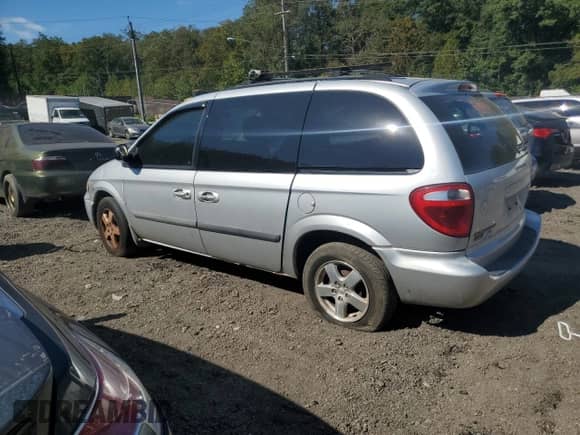 2006 Dodge Caravan SXT with VIN 1D4GP45R06B750264, listed as a Copart auction lot 85164015 with 176,100 mi miles and Salvage title. Bid and sale history available at DreamBid. Image 2.