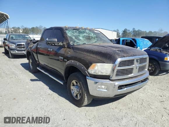 2010 Dodge 2500 SLT z VIN 3D7TT2CTXAG190155, wystawiony jako Copart lot #77340684 z przebiegiem 157 170 mil mil oraz Szkoda całkowita • Salvage title. Historia ofert i sprzedaży dostępna na DreamBid. Obrazek 4.