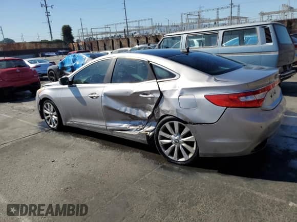 2013 Hyundai Azera z VIN KMHFH4JGXDA245194, wystawiony jako Copart lot #77252934 z przebiegiem 128 712 mil mil oraz Czysty tytuł • Clean title. Historia ofert i sprzedaży dostępna na DreamBid. Obrazek 2.