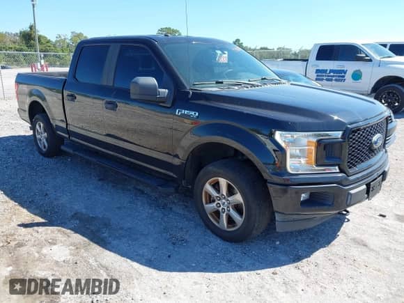 2019 Ford F-150 Lariat with VIN 1FTFW1E41KFD28179, listed as a IAAI auction lot 43460411 with 185,554 mi miles and . Bid and sale history available at DreamBid. Image 1.