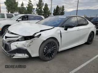2023 Toyota Camry XSE with VIN 4T1K61AK4PU111727, listed as a Copart auction lot 85576385 with 50,304 mi miles and Salvage title. Bid and sale history available at DreamBid. Image 1.