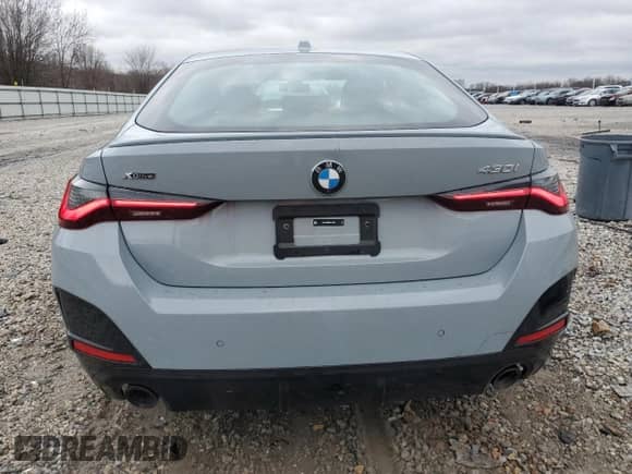 2025 BMW 4 Series 430i xDrive with VIN WBA33FB09SFT77055, listed as a Copart auction lot 86205044 with 1,379 mi miles and Salvage title. Bid and sale history available at DreamBid. Image 6.