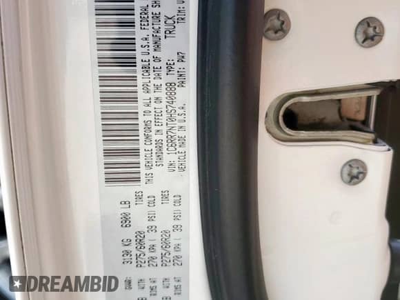 2017 Ram 1500 Laramie with VIN 1C6RR7NT0HS740888, listed as a Copart auction lot 65405185 with 119,104 mi miles and Salvage title. Bid and sale history available at DreamBid. Image 13.