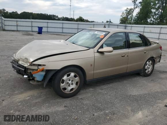2001 Saturn LS with VIN 1G8JW54R11Y557232, listed as a Copart auction lot 74638904 with 158,729 mi miles and Salvage title. Bid and sale history available at DreamBid. Image 1.