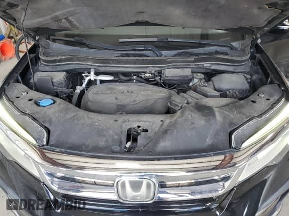 2019 Honda Pilot Touring 8-Passenger z VIN 5FNYF6H93KB033523, wystawiony jako Copart lot #70325145 z przebiegiem 92 401 mil mil oraz Szkoda całkowita • Salvage title. Historia ofert i sprzedaży dostępna na DreamBid. Obrazek 11.