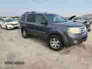 2009 Honda Pilot Touring with VIN 5FNYF48969B025883, listed as a Copart auction lot 70923065 with 192,552 mi miles and Salvage title. Bid and sale history available at DreamBid. Image 4.