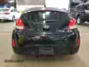 2013 Hyundai Veloster w/Black Int z VIN KMHTC6AD3DU111385, wystawiony jako Copart lot #86124085 z przebiegiem 144 014 mil mil oraz Czysty tytuł • Clean title. Historia ofert i sprzedaży dostępna na DreamBid. Obrazek 6.