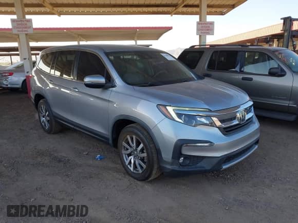 2020 Honda Pilot EX z VIN 5FNYF5H36LB026184, wystawiony jako IAAI lot #41708011 z przebiegiem 67 991 mil mil oraz . Historia ofert i sprzedaży dostępna na DreamBid. Obrazek 1.