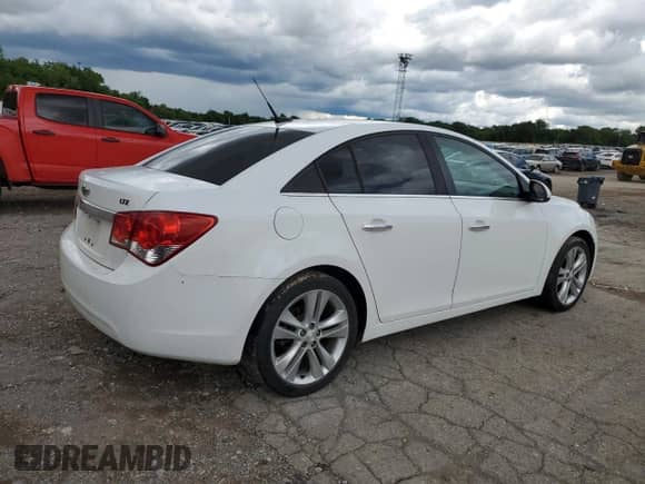 2014 Chevrolet Cruze LTZ с VIN 1G1PG5SB9E7411751, выставлен на аукционе Copart как лот 55830125 с пробегом 159 786 миль миль и Списание • Salvage title. История ставок и продаж доступна на DreamBid. Изображение 3.
