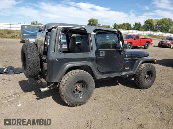 1998 Jeep Wrangler Sport z VIN 1J4FY19SXWP734488, wystawiony jako Copart lot #81896775 z przebiegiem 180 236 mil mil oraz Czysty tytuł • Clean title. Historia ofert i sprzedaży dostępna na DreamBid. Obrazek 3.