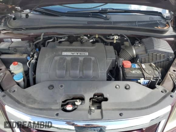 2008 Honda Odyssey LX с VIN 5FNRL38288B116128, выставлен на аукционе Copart как лот 68338135 с пробегом 128 485 миль миль и Списание • Salvage title. История ставок и продаж доступна на DreamBid. Изображение 12.