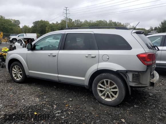 2014 Dodge Journey SXT with VIN 3C4PDCBB8ET284345, listed as a Copart auction lot 86626755 with 182,841 mi miles and Salvage title. Bid and sale history available at DreamBid. Image 2.